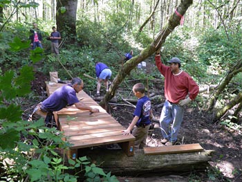 Boy Scouts working on Trail Bridge